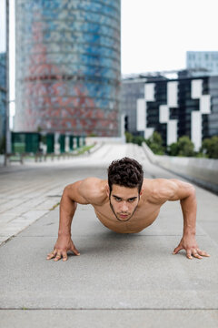 Young man during workout, pushup