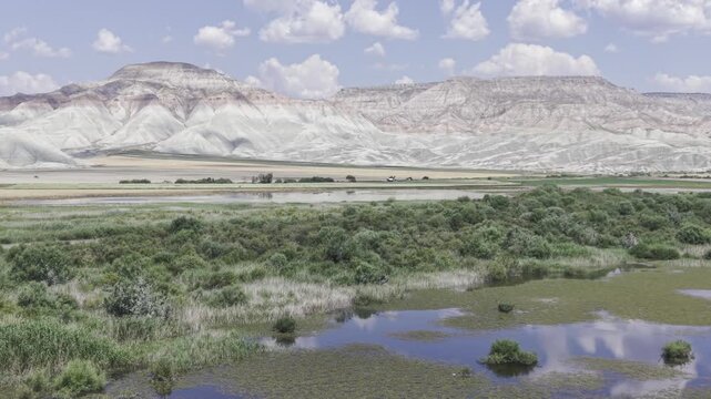 Drone Footage of Nallihan Bird Sanctuary and Rainbow Hills in Ankara Turkey Showing Wetlands and Colorful Geological Landscape