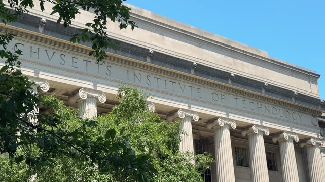 Classical facade of the Massachusetts Institute of Technology building in Cambridge, Massachusetts, with columns and engraved lettering