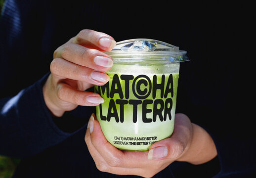Holding Transparent Matcha Cup Mockup 