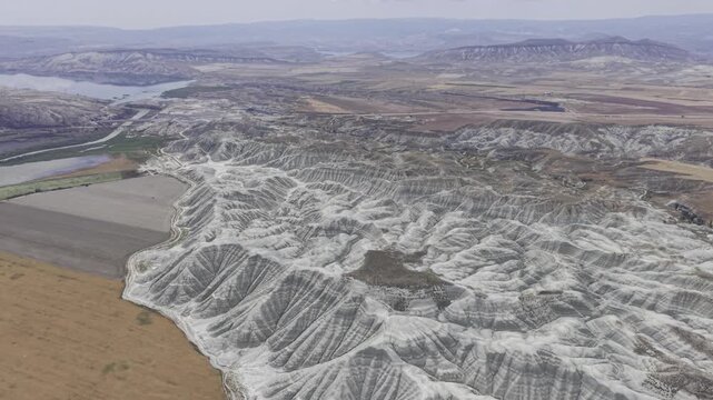 Drone Footage of Nallihan Bird Sanctuary and Rainbow Hills in Ankara Turkey Showing Wetlands and Colorful Geological Landscape