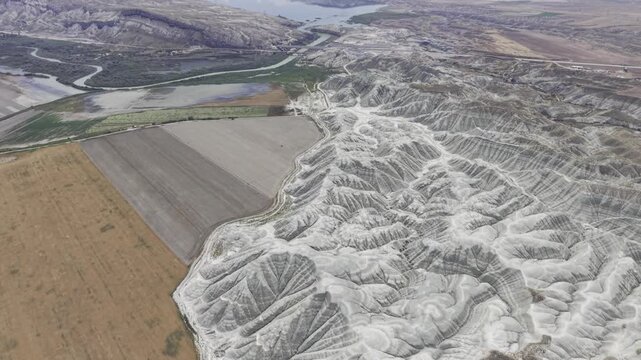 Drone Footage of Nallihan Bird Sanctuary and Rainbow Hills in Ankara Turkey Showing Wetlands and Colorful Geological Landscape