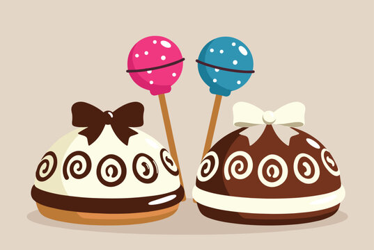 Two decorative dome shaped chocolate and cream pastries with bows next to two colorful lollipops on a plain background.