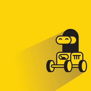 cartoon robot icon with shadow on yellow background