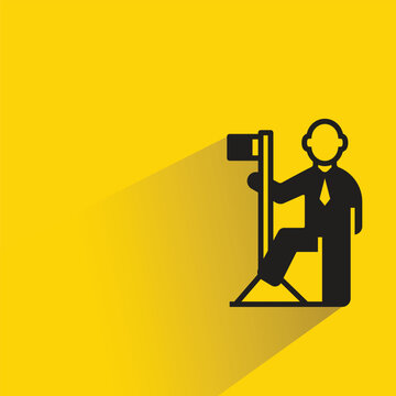businessman and flag pole icon with shadow on yellow background