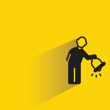 people holding bell icon with shadow on yellow background