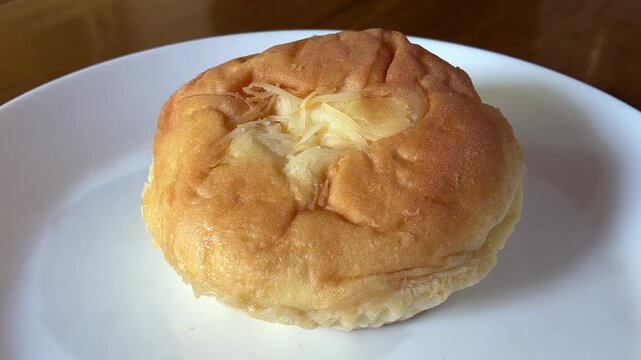 Homemade Cheese Bun Bakery Food Video Spinning on White Plate