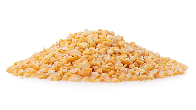 Pile of yellow split peas isolated on white background close-up