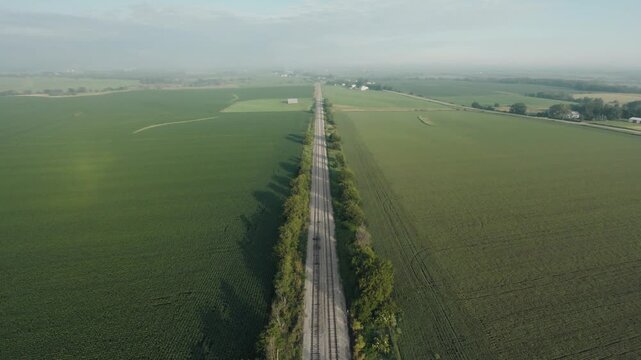 Aerial shot of a lonely road in rural Iowa