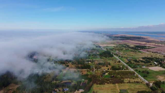 Hyperlapse reveals sea fog rolling across Bernāti, Liepāja Lake, A11 highway