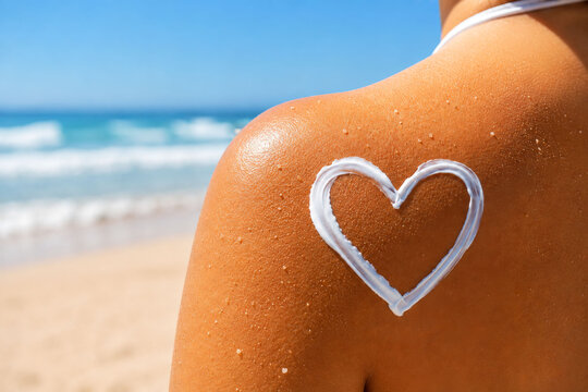 Sunscreen Heart on Shoulder as a Beach UV Protection Concept