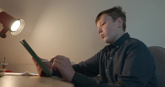 Kid Boy Draw with Stylus Pen on Tablet. 4K 10-bit