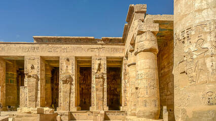 Fototapeta premium Medinet Habu, the mortuary temple of Ramesses III, located on the west bank of Luxor, Egypt.
