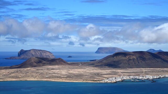 Golden Hour Landscape Vista of Risco de Famara Cliffs, El Rio Strait, and the Chinijo Archipelago in Canary Islands