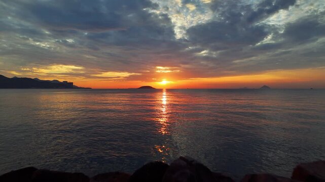 low arial footage flying out of Nha Trang beach for a sunrise 