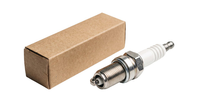 Shiny metallic spark plug with a white ceramic insulator body positioned next to a small brown rectangular cardboard packaging box isolated on a clean white studio background for automotive parts.