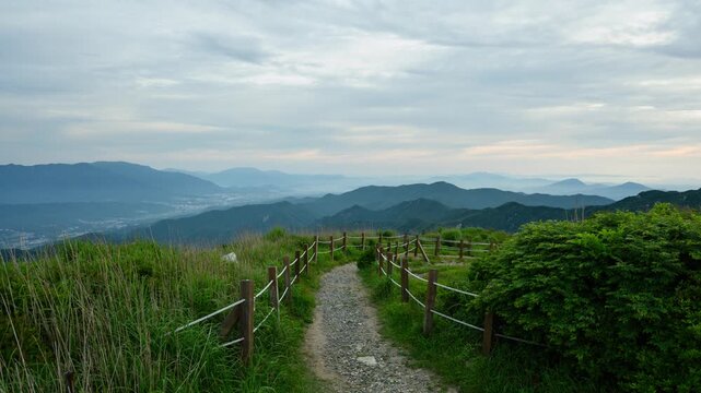 Mountain Trail with Mountain Range View on Cloudy Day Timelapse
