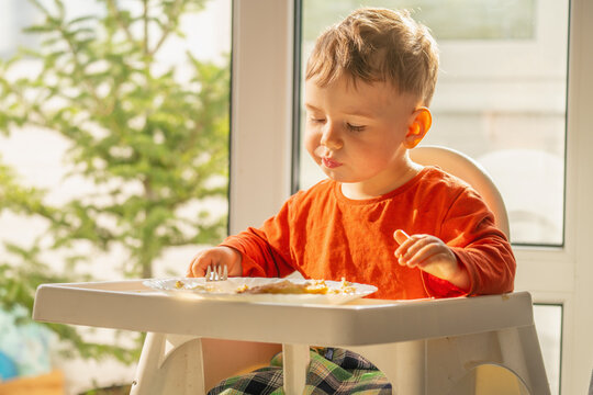 The "I can do it myself" stage of child development during mealtime.