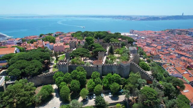 Aerial circular view from S&atilde;o Jorge Castle in Lisbon with tejo river at background,Portugal.