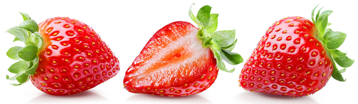 Three juicy ripe strawberries, one of which is cut in half, isolated on transparent background