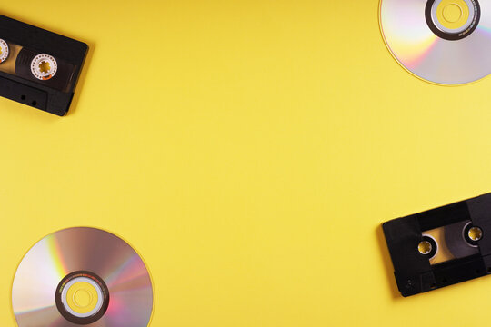 physical media comeback background with music cassette tapes and CDs
