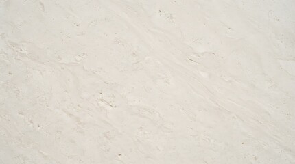 Fototapeta premium Close up of a beige textured surface with a rough marbled appearance