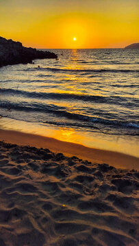 Romantic sunset at Marmari beach, Peloponnese, Greece