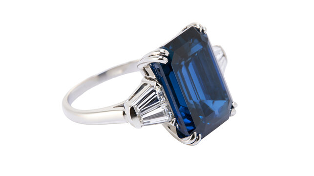 Emerald cut deep blue sapphire ring with baguette diamonds, isolated on transparent background