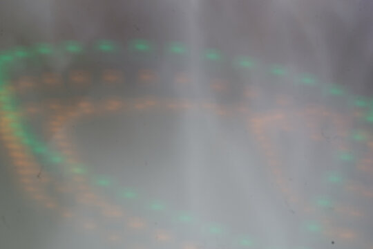 Blurred rainbow light of audio equipment signal.
