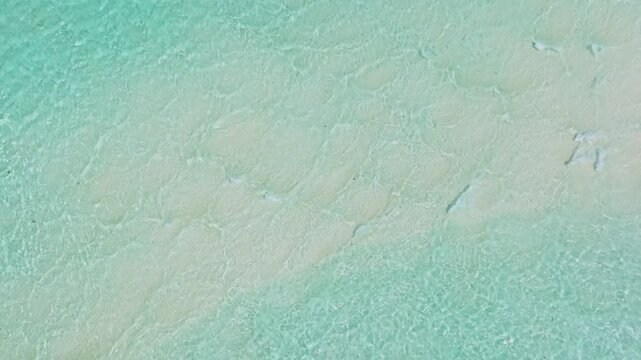 Aerial drone of sea waves in slow motion on a tropical beach. Philippines