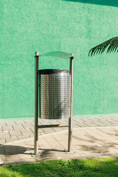 Public Trash Bin in an Urban Green Space Promoting Proper Waste Disposal and Clean Public Environments