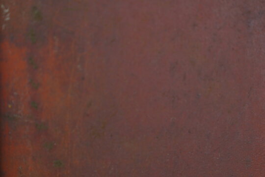 Close Up Textured Abstract Background of Weathered Rusty Metal Surface with Hints of Orange Green and Distressed Organic Pattern for Industrial Grunge Themes