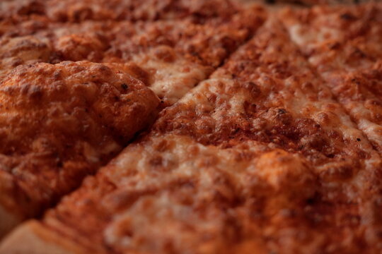 Hot Cheesy Pizza Slice Fresh from the Oven Delicious Comfort Food for Dinner or Lunch with Golden Brown Crust