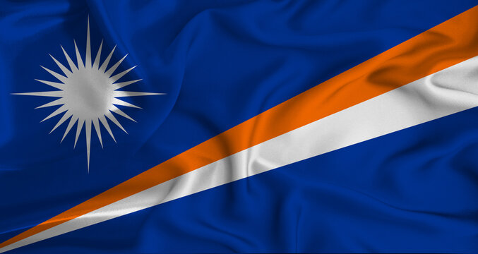 Realistic Marshall Islands flag waving. Close up of flag of Marshall Islands with cloth texture