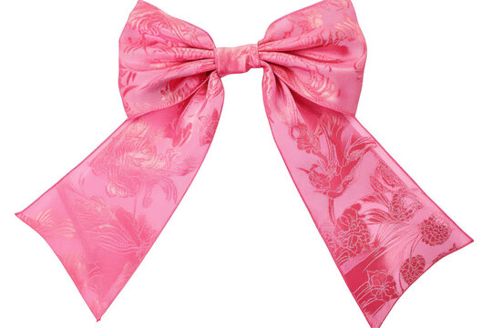 An elegant pink satin ribbon bow featuring delicate floral patterns against a black background