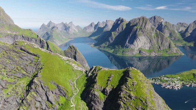 Spectacular 4K Drone Aerial of Reinebringen Overlooking Reine Village and Fjords, Lofoten Islands, Norway