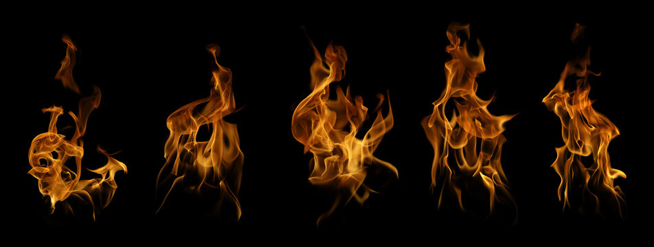 Realistic fire flames isolated on black background with burning blaze, glowing heat, transparent overlay, abstract fire texture, and cinematic visual effect for creative design projects.