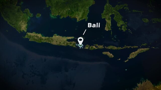 Satellite map zoom to Bali, Indonesia with a white location pin marker, concentric circle highlight, and typography. Ideal for travel documentaries, broadcast graphics, or geographical presentations.
