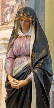 PISA, ITALY - JUNE 22, 2026: The carved polychrome statue of Virgin Mary at the tomb - Lady of Sorrow in the church Chiesa di Santa Maria del Carmine by unknown baroque artist. 