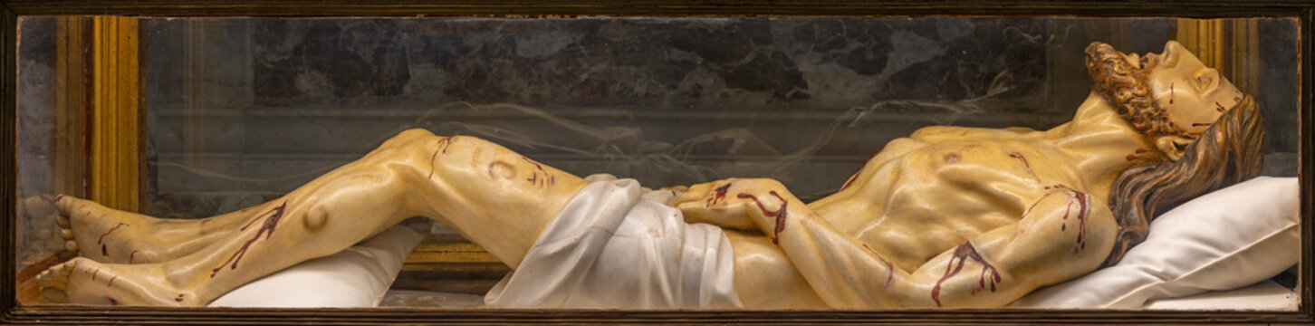 PISA, ITALY - JUNE 22, 2026: The carved polychrome statue of Jesus in the tomb in the church Chiesa di Santa Maria del Carmine by unknown baroque artist. 