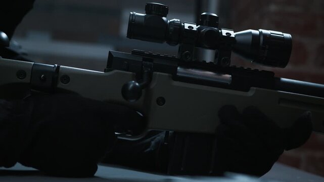 Cinematic side view of a scoped bolt-action sniper rifle resting in a dark, moody interior with brick walls behind.