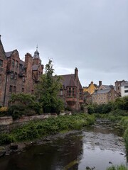 Fototapeta premium Dean Village, Edinburgh, medieval, Scotland, grey sky, Europe, lowlands