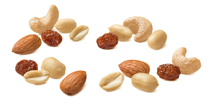Peanut, cashew and almond nuts, raisin berries isolated on white background. Real photography.