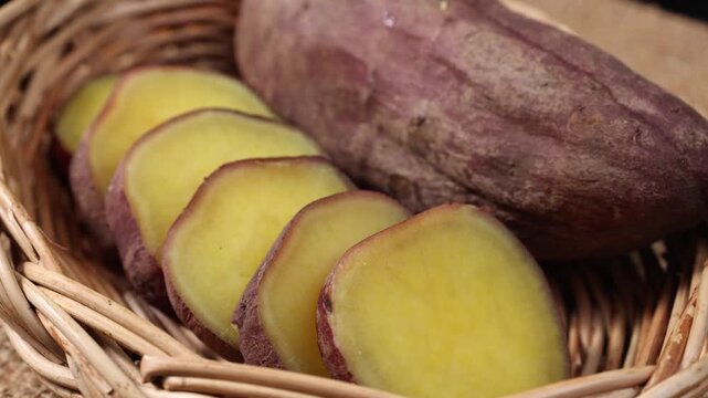 Sliced Sweet Potatoes in a Wicker Basket