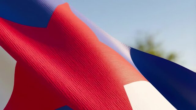 Close up of a vibrant juneteenth flag waving in the breeze showcasing bold red white and blue colors symbolizing freedom emancipation
