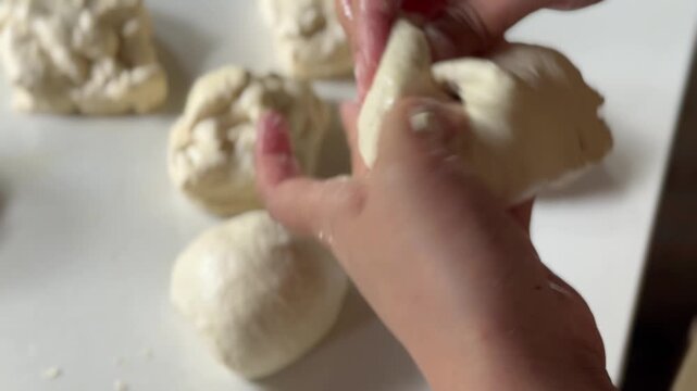Preparation homemade pizza on kitchen table
