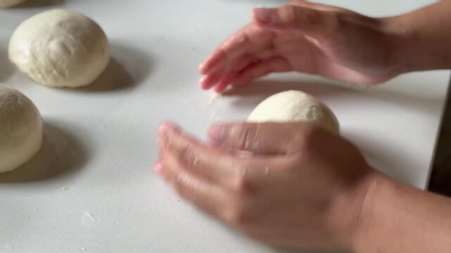 Preparation homemade pizza on kitchen table
