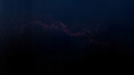 Abstract dark blue space background with red nebula glow, cinematic night sky texture for banners, wallpapers, sci-fi design © GraphicsWorld