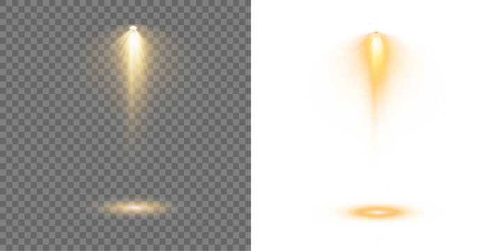 Collection of spotlights arranged in symmetrical lighting design. Stage lights shine vertically, highlighting dramatic show moments. Bright white beams cut through atmospheric haze effects. 