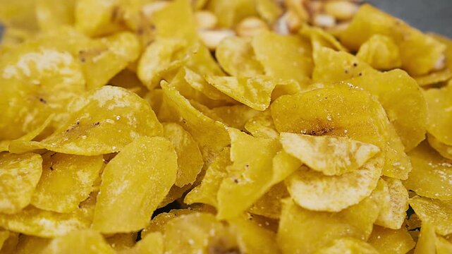 Crispy Peruvian chifles fried plantain chips in a bowl.